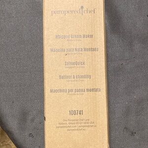Pampered Chef Whipped Cream Maker new in box( box has some damage). See pic